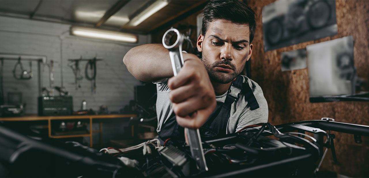 Mechanic working on a motorcycle
